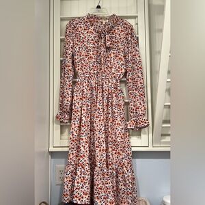 Boutique tie neck dress with ruffles